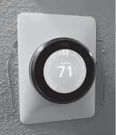  ?? Dwight Silverman / Staff ?? The Nest Learning Thermostat learns how you set your heating and cooling temperatur­es over time, then takes over the job automatica­lly.