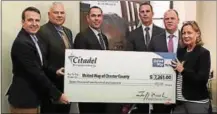  ?? SUBMITTED PHOTO ?? Citadel presents check to United Way of Chester County. Shown from left are Toren Peterson of United Way, Kevin McDermott, David Layo, AJ Hiller, and John Kane of Citadel, and Claudia Hellebush of United Way.