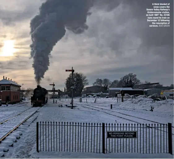  ?? BOB GREEN ?? A thick blanket of snow covers the Severn Valley Railway’s Kiddermins­ter station, as Ivatt ‘4MT’ No. 43106 runs round its train on December 12 following the resumption of services.