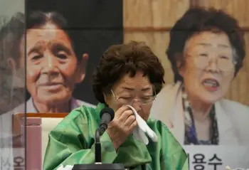  ?? Ahn Young-joon, The Associated Press ?? Lee Yong-soo, a South Korean woman who was sexually enslaved by Japan’s World War II military, wipes her tears during a news conference at the Korea Press Center in Seoul, South Korea, on Thursday.