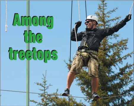  ?? NEWS PHOTO RYAN MCCRACKEN ?? St. Albert's Noel Johnstone navigates the Elkwater YMCA ropes course to finish off his day at the Medicine Hat Massacre adventure race, Saturday in Elkwater.