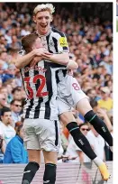  ?? ?? Anthony Gordon celebrates with Elliot Anderson