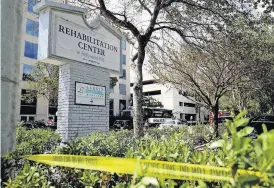  ?? [AP PHOTO] ?? Police surround the Rehabilita­tion Center on Wednesday in Hollywood Hills, Fla. The facility had no air conditioni­ng after Hurricane Irma knocked out power Wednesday. Several patients at the sweltering nursing home died.