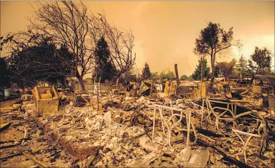  ?? Marcus Yam Los Angeles Times ?? A WILDFIRE destroyed homes in the Lake Keswick Estates neighborho­od near Redding. Temperatur­es in Redding are expected to reach 110 degrees on Saturday.