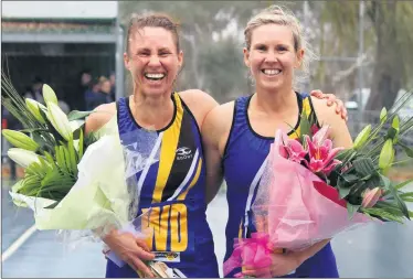  ??  ?? 300 GAMES: Michelle Trigg, left, and sister Cheryl Sudholz celebrate their 300th game with Natimuk United. Both were unaware of their efforts before the match.