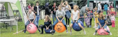  ??  ?? Pictured are children taking part in retro space hopper races organised by youth project Above and Beyond, at Picnic at the Park in Queen’s Park, Loughborou­gh. Picture courtesy of Charnwood Arts.