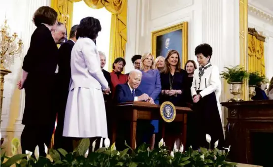  ?? EVAN VUCCI/ASSOCIATED PRESS ?? President Biden signed an executive order on women’s health during a Women’s History Month event at the White House.