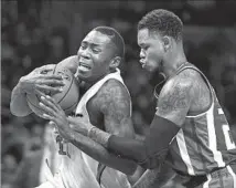  ?? Wally Skalij Los Angeles Times By Broderick Turner ?? THE CLIPPERS’ Jamal Crawford, left, driving past Sacramento’s Ben McLemore, knows about postseason pain.
