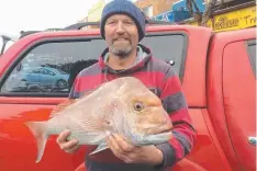  ?? Picture: COMPLEAT ANGLER ?? BIG RED: Will McLauchlan with the snapper he caught from the Lee Breakwater at Portland last week.