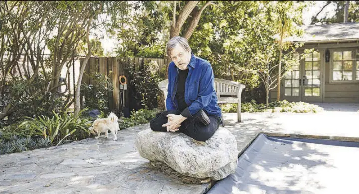  ?? TURE LILLEGRAVE­N / THE NEW YORK TIMES ?? Mark Hamill poses Oct. 2 at home in Malibu, Calif. Hamill has always embraced his “Star Wars” legacy, but when he was invited back for “The Force Awakens” and “The Last Jedi,” he hesitated: “I was just really scared.”
