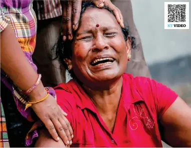  ?? Reuters ?? A relative of a victim of the explosion at St Anthony’s Shrine, Kochchikad­e, reacts at the police mortuary in Colombo. —