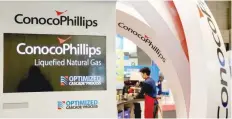  ?? — Reuters ?? Logos of Conocophil­lips are seen in its booth at Gastech, the world’s biggest expo for the gas industry in Chiba, Japan.