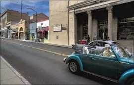  ?? ON MAIN STREET ?? in Bisbee, restaurant­s are open for dining, and shops are seeing a steady stream of patrons, including visitors from Northern states.