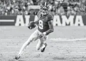  ?? Vasha Hunt / Associated Press ?? Quarterbac­k Bryce Young helped lead Alabama to the No. 1 seed in the College Football Playoff.