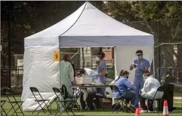  ?? KARL MONDON — STAFF PHOTOGRAPH­ER ?? Researcher­s began testing residents of San Francisco’s heavily Latino Mission District for the coronaviru­s on Saturday.