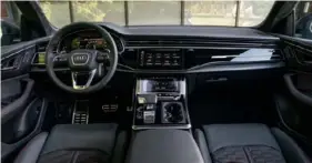  ?? ?? The interior of the 2024 Audi RS Q8 provides plenty of creature comforts, plus a handsome dashboard and Audi’s signature hard-push haptic touchscree­n.