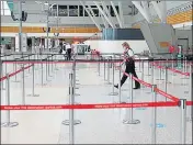  ?? REUTERS ?? A largely empty domestic terminal at Sydney airport.