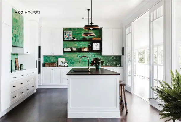  ??  ?? KITCHEN “The feature tiles are so unique,
I don’t think we will ever tire of them,” says Kate. Custom-coloured Cotto Etrusco tiles. Pendant lights, Dezion Studio. Island benchtop is Paperock in Leather. Other benchtops, Corian ‘Glacier White’....