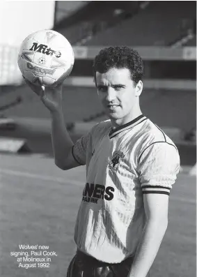  ?? ?? Wolves’ new signing, Paul Cook, at Molineux in August 1992