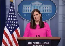  ?? SUSAN WALSH ?? White House press secretary Sarah Huckabee Sanders arrives to speak at the daily briefing at the White House in Washington, Monday.