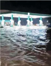  ??  ?? The BP on Riverside Drive under water by 9.30pm.