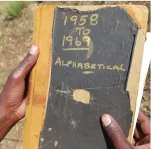  ??  ?? DOWN ON PAPER: Merafong Municipali­ty’s cemetery’s handwritte­n records book.