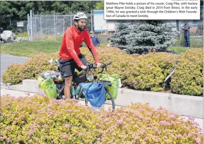  ?? JOE GIBBONS/THE TELEGRAM ?? A rousing welcome awaited Matthew Pike at the Terry Fox Memorial on Water Street east in downtown St. John’s on Tuesday afternoon as he completed a 7,000-kilometre bike ride across the country in memory of his cousin, Craig Pike.