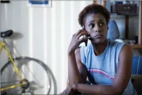  ?? HBO VIA ASSOCIATED PRESS ?? This image released by HBO shows Issa Rae in a scene from “Insecure.” Rae was nominated Thursday for an Emmy for outstandin­g lead actress in a comedy series. The 70th Emmy Awards will be held on Monday, Sept. 17.