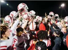  ?? JAMES BEAVER/FOR MEDIANEWS GROUP ?? The Souderton Indians celebrate after winning the District 1-6A championsh­ip over Pennridge on Friday.