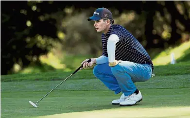  ??  ?? Focused: Kevin Streelman lining up a putt on the 16th green during the first round of the Pebble Beach National Pro-Am at the Spyglass Hill Golf Course on Thursday. — AFP
