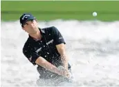  ?? STREETER LECKA/GETTY IMAGES ?? Kevin Kisner, blasting out of the sand, shot a 4-under 67 at Quail Hollow to share the lead with Hideki Matsuyama.