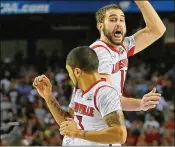  ?? CURTIS COMPTON / ATLANTA JOURNAL-CONSTITUTI­ON ?? Louisville’s Peyton Siva (left) and Luke Hancock celebrate as time runs out in their victory over Michigan in the 2013 title game.