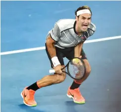  ?? Der Moment des Sieges: Roger Federer in Melbourne Foto: AFP/Peter Parks ??