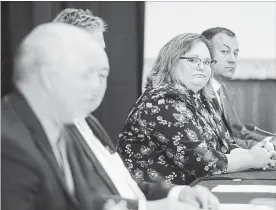  ?? PAT KANE THE CANADIAN PRESS ?? Alberta deputy premier Sarah Hoffman, listens to B.C. Premier John Horgan at the Western Premiers’ Conference in Yellowknif­e, last Wednesday.