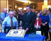  ?? GLENN GRIFFITH — MEDIANEWS GROUP FILE ?? Boscov’s store manager Jay Janowsky, left, and Clifton Park Supervisor Philip Barrett, right, mark the company’s 100th anniversar­y in 2015during a celebratio­n at its Clifton Park store.