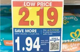  ?? DEE-ANN DURBIN/AP ?? A digital-only coupon for Pampers baby wipes on Tuesday at a Kroger supermarke­t in Ann Arbor, Mich., shows a 25-cent price reduction if scanned by shoppers.