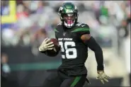  ?? STEVEN RYAN — THE ASSOCIATED PRESS ?? New York Jets’ Le’Veon Bell (26) rushes during the first half of an NFL football game against the New York Giants, Sunday in East Rutherford, N.J.