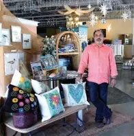  ?? The Associated Press ?? Q Martin Garcia, owner of gift and décor store Gramercy Gift Gallery, poses for a photo at his shop on Wednesday in San Antonio. Landlords were forgiving about rent during the first two years of the pandemic, but now many are asking for back due rent.