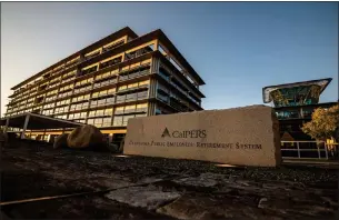  ?? XAVIER MASCAREÑAS THE SACRAMENTO BEE ?? The California Public Employees' Retirement System, or CalPERS, headquarte­rs buildings seen in late 2021 in downtown Sacramento. A bill to bar state pension funds from investing in fossil fuel firms passed two key committees recently.