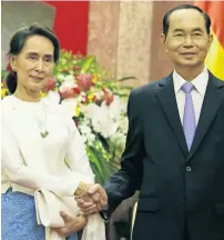  ?? AFP ?? Aung San Suu Kyi meets Vietnam’s president Tran dai Quang at the presidenti­al palace at the sideline of the World economic Forum on Asean in hanoi on Thursday. —