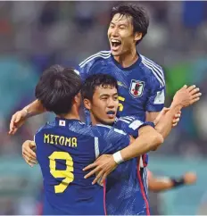  ?? Reuters ?? ■ Japan’s Kaoru Mitoma, Wataru Endo and Yuto Nagatomo celebrate after the match.