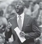  ?? THE ASSOCIATED PRESS FILE PHOTO ?? The Atlanta Hawks are giving Lloyd Pierce his first head coaching job in the NBA, choosing a man who has been an assistant with Philadelph­ia and Memphis to rebuild the franchise.