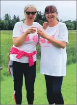  ?? ?? Right: Sandra Ironside, right, with Gaynor Wotherspoo­n after finishing The Virtual MoonWalk Scotland in 2021.