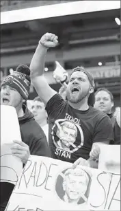  ?? Billy Hurst
Associated Press ?? ST. LOUIS RAMS FAN displays a “Trade Stan” message — a show of hostility toward franchise owner Stan Kroenke, who seeks to move the team.