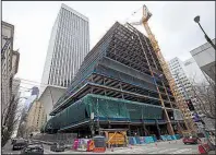  ?? The Seattle Times/ELLEN M. BANNER ?? Amazon’s new building in Rainier Square is at Fifth Avenue and Union Street in Seattle. It appears that Amazon will put its share of the building up for sublease.