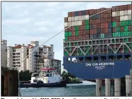  ?? (AP) ?? The container ship CMA CGM Argentina arrives at Port Miami in April. The U.S. economy grew at a solid 6.4% rate in the first three months of this year.