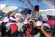  ?? REUTERS ?? Children travelling with migrants from Central America at a camp near the San Ysidro checkpoint in Mexico on 3 May.