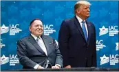  ?? PATRICK SEMANSKY / AP ?? In this Dec. 7, 2019, file photo, President Donald Trump stands alongside Las Vegas Sands Corp. Chief Executive and Republican mega donor Sheldon Adelson before speaking at the Israeli American Council National Summit in Hollywood, Fla.