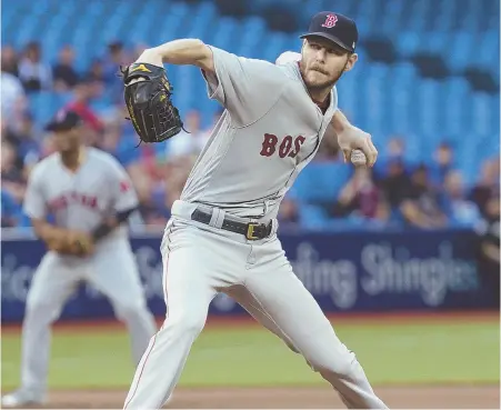  ?? AP PHOTO ?? ON TARGET: Chris Sale delivers a pitch during his dominating victory against the Blue Jays last night in Toronto. Sale allowed just three hits before being lifted in the eighth inning.