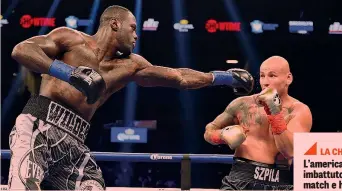  ??  ?? Una fase del match del 2016 tra Deontay Wilder, a sinistra, e il polacco Artur Szpilka